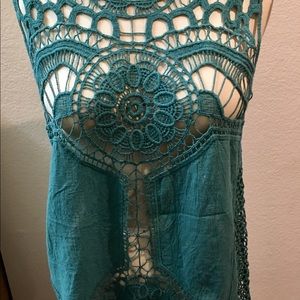 Knit / cotton top with beautiful details.